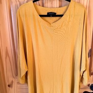 Toni T’s Woman’s yellow top